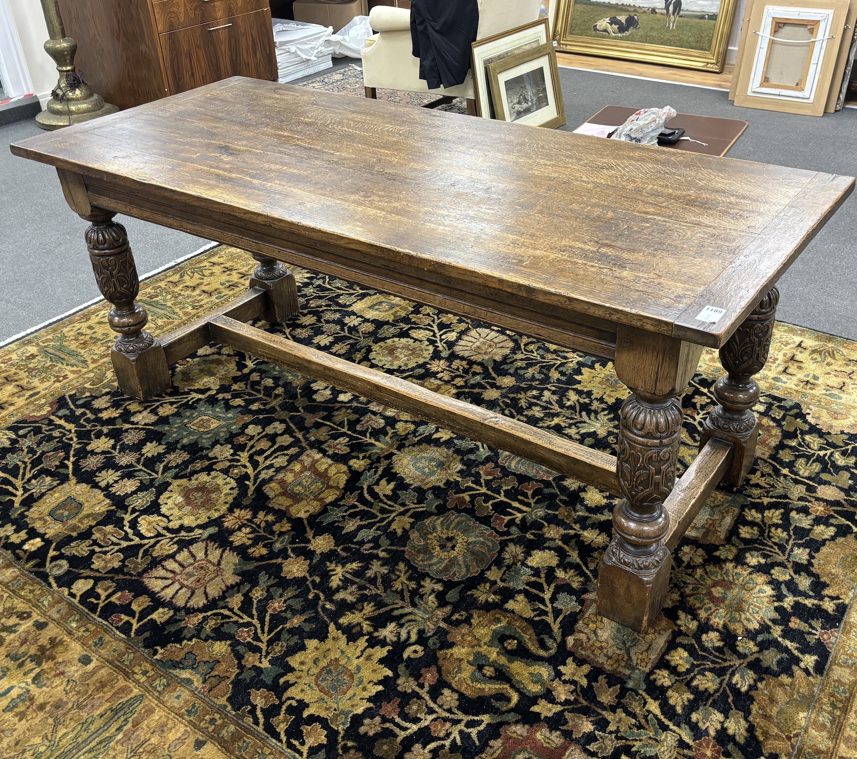 An early 20th century Jacobean revival rectangular oak refectory dining table, length 182cm, width 77cm, height 75cm